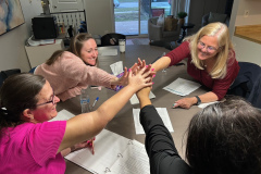 Mentors and client high-fives to new beginnings!