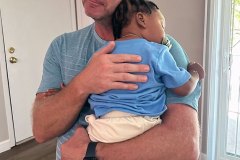 mentor-holding-baby