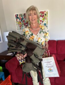 NNNC donates school supplies NNNC member donating backpacks and gift cards to FHF
